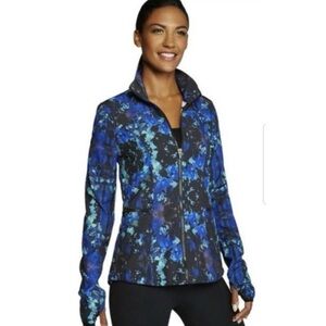 Fabletics high neck zip front windbreaker in blue multi splatter print. Size S